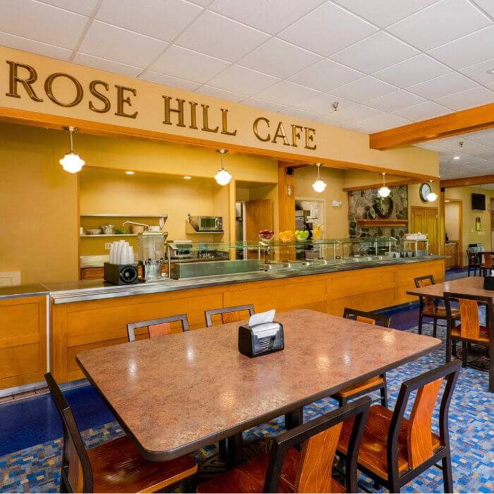 A welcoming cafe within Rose Hill Center, providing a comfortable space for residents to socialize, enjoy refreshments, and foster a sense of community