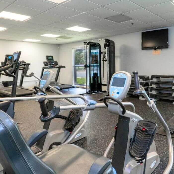 The fitness center at Rose Hill Center, equipped with modern exercise equipment to promote physical well-being