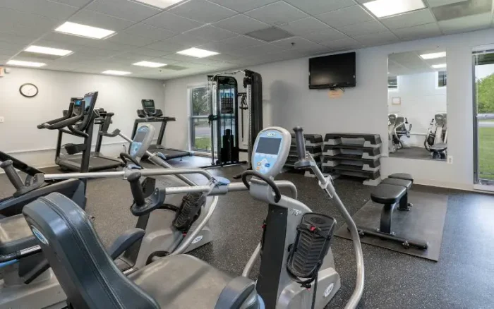 The fitness center at Rose Hill Center, equipped with modern exercise equipment to promote physical well-being